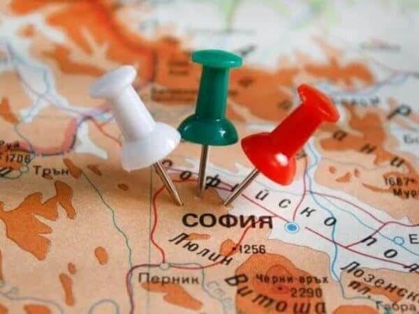 A map of Bulgaria with colored pins at Sofia.