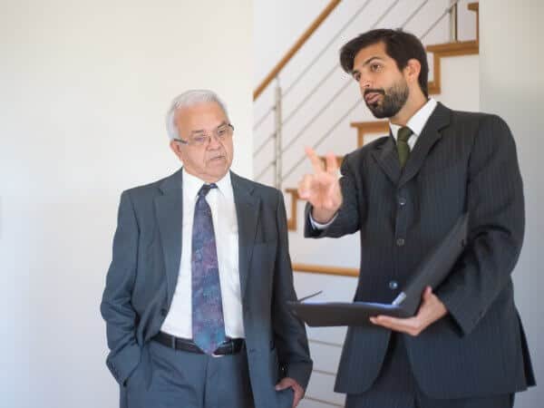 A real estate agent is touring a buyer in a house to buy in Bulgaria.