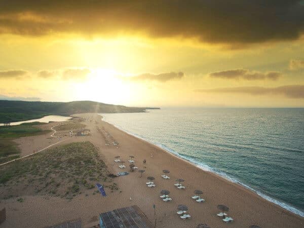 Buy Land in Bulgaria 9 Aerial view over sunset of a coastal plot of land to buy by the Black Sea in Bulgaria.