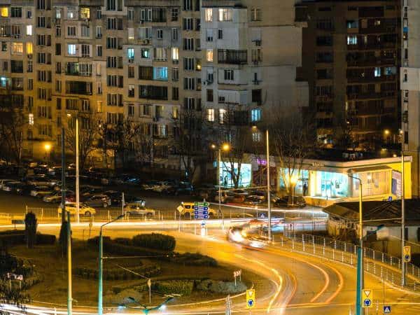 View by night of real estate properties over a busy road in Sofia.