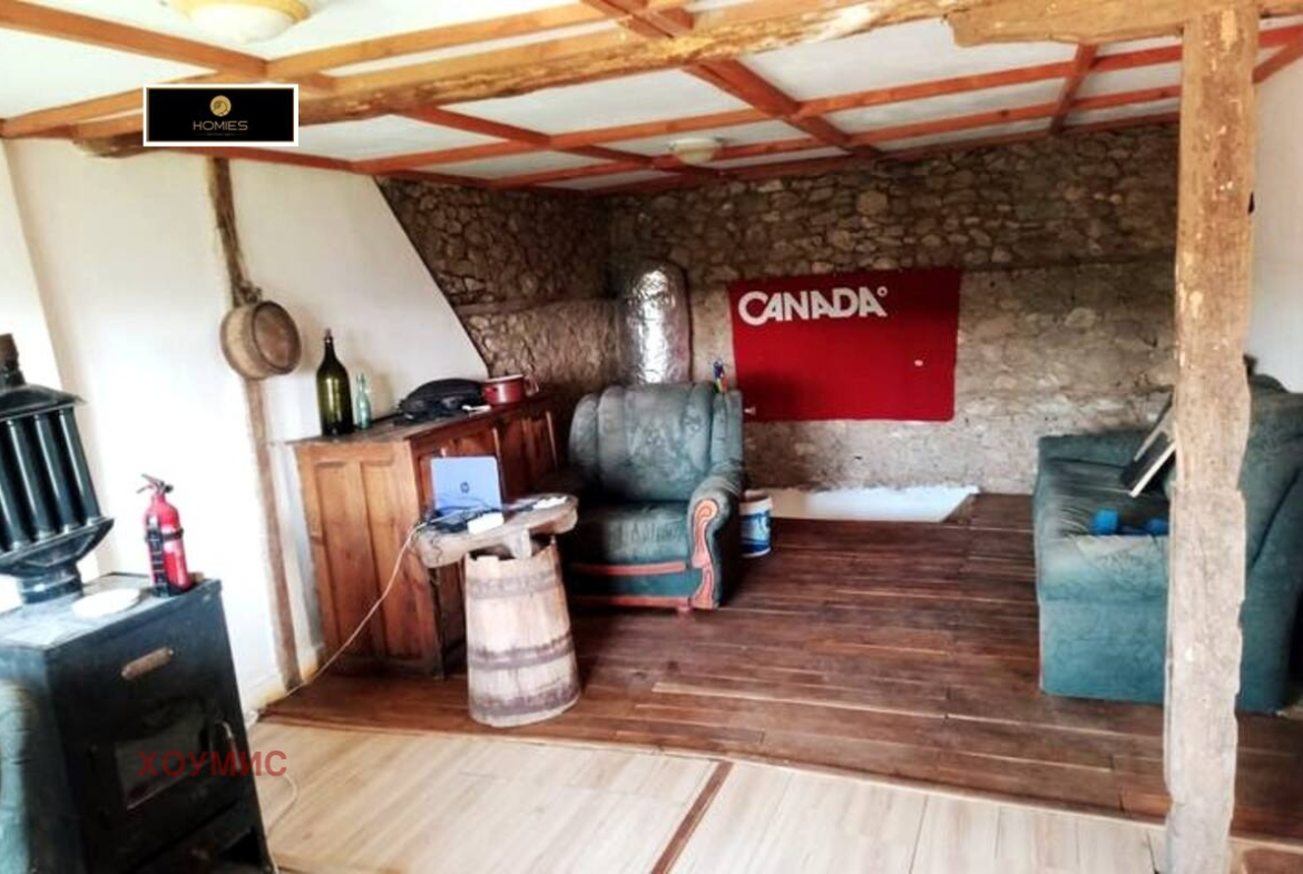 Interior space with wooden beams and traditional Canadian barrel