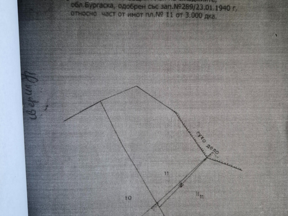 Land plot sketch with measurements and property boundaries