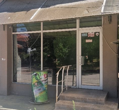 Shop entrance with storefront and door