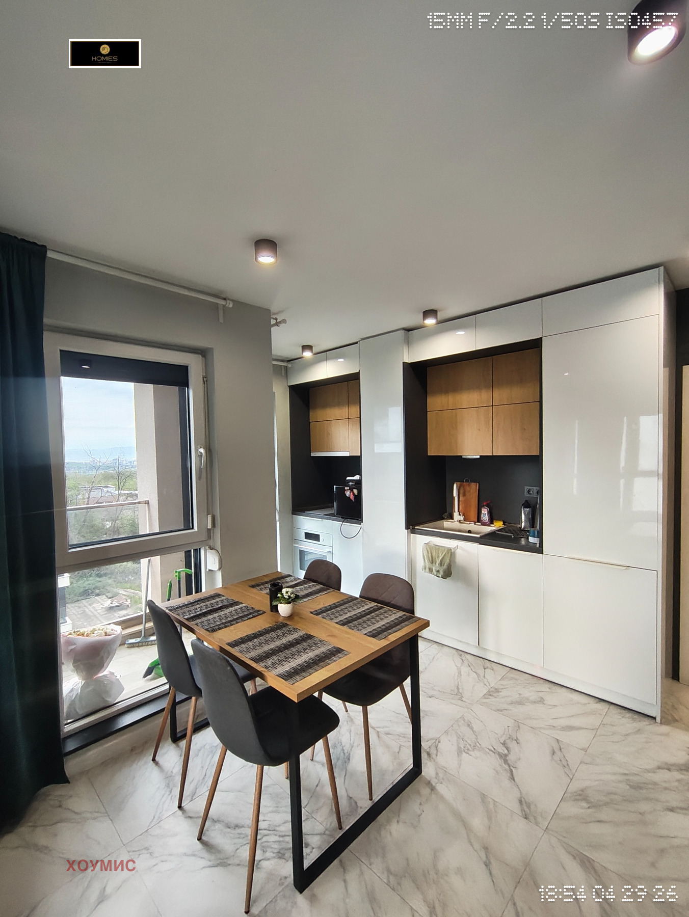 tristaen-apartament-99-kvm-prodazhba-dragalevtsi-panoramna-gledka-3 Кухня детайл със мивка и бели модулни единици