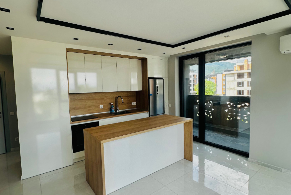 Modern kitchen with island and white cabinets